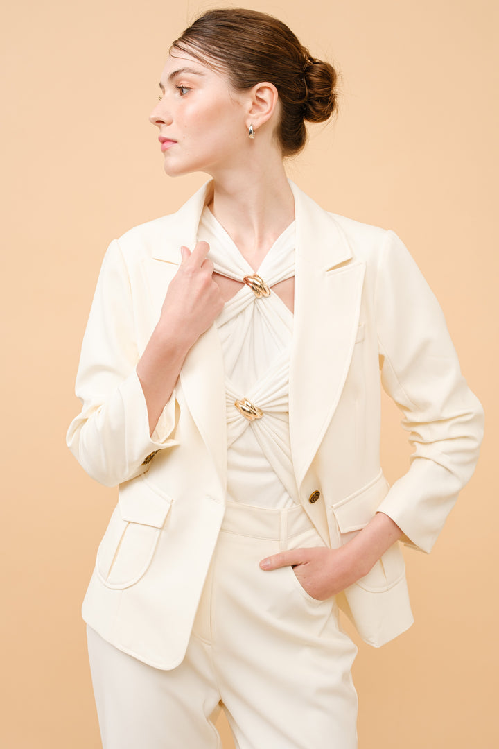 BLUSA MANGA LARGA CON AROS DORADOS