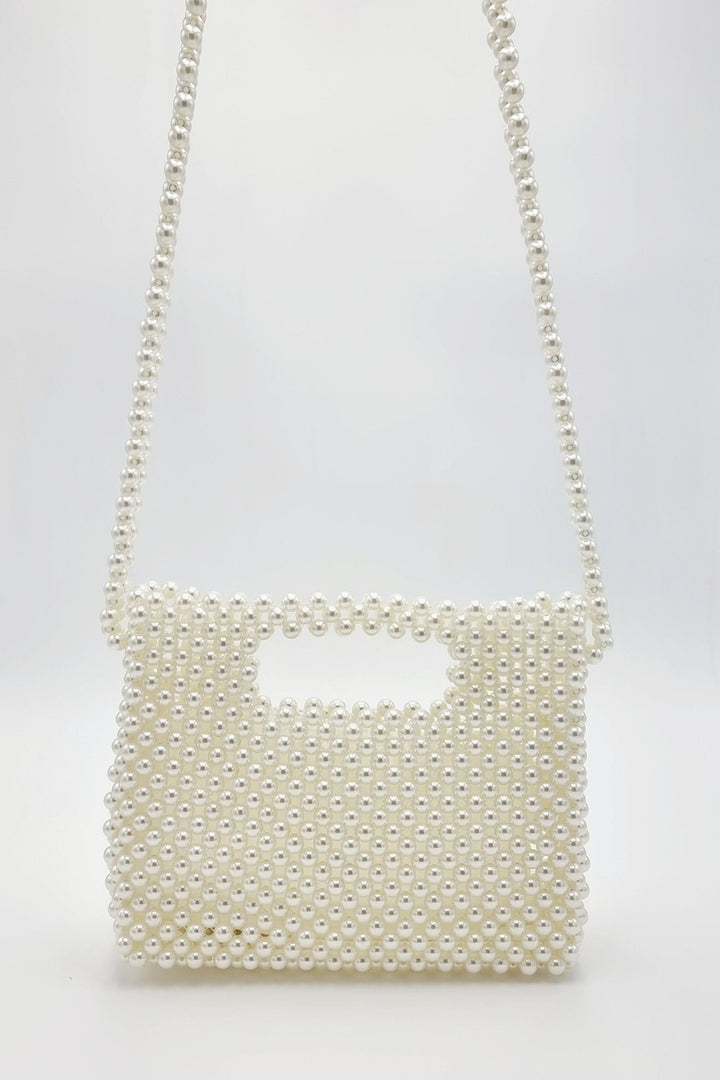 BOLSO PERLAS CON ASA INTEGRADA Y CORREA