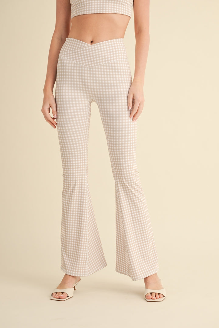 SET LEGGINGS ACAMPANADOS Y TOP CON ESTAMPADO A CUADROS