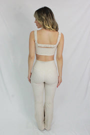 SET LEGGINGS ACAMPANADOS Y TOP CON ESTAMPADO A CUADROS